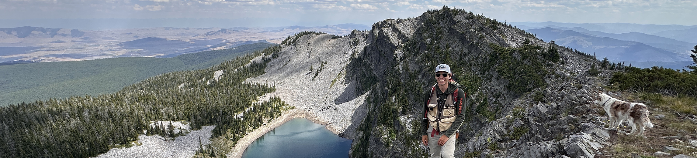 MBMG geologists hiking on Red Mountain.